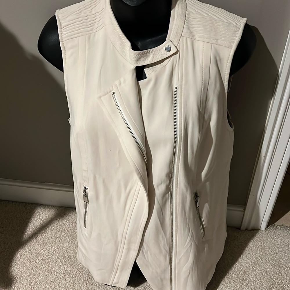 Babaton cream vest. Only worn a few times. Excellent condition